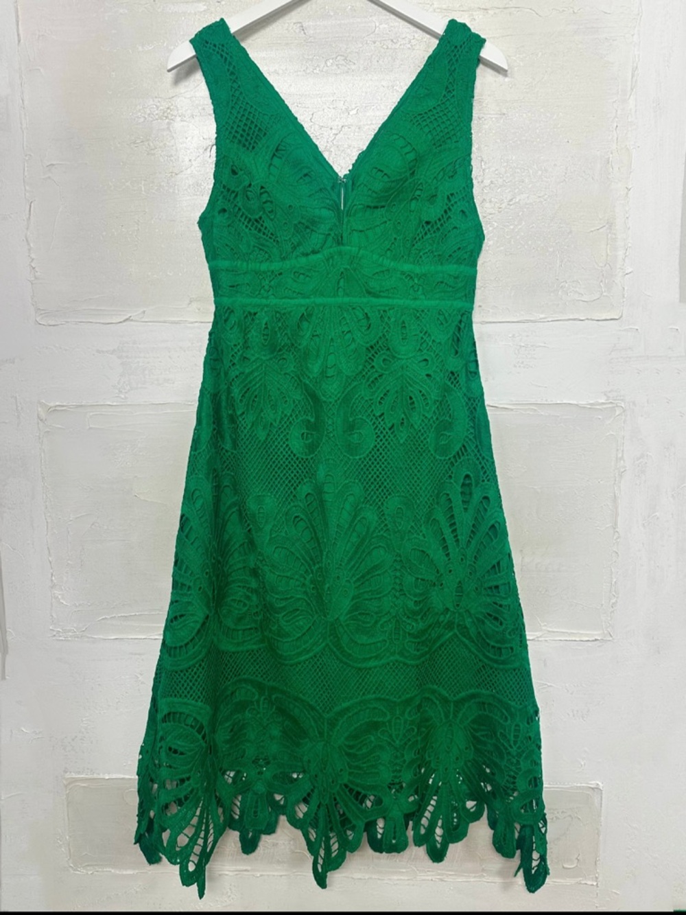 New w tags. Green lace dress Skies and Blue